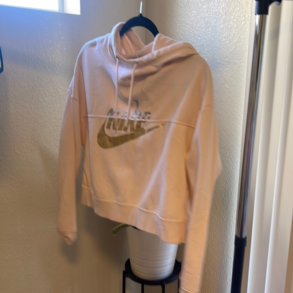 Pink cropped Nike hoodie